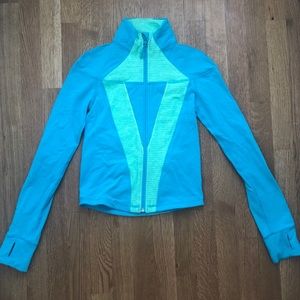blue and green ivivva zip up